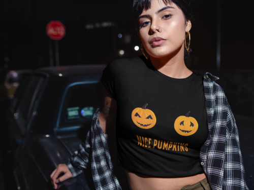 hispanic-woman-wearing-a-crop-top-tee-mockup-and-a-plaid-shirt-at-night-a19419